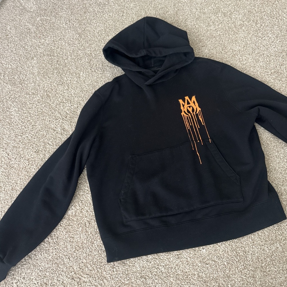 AMIRI Black Hoodie with Dripping Orange Logo